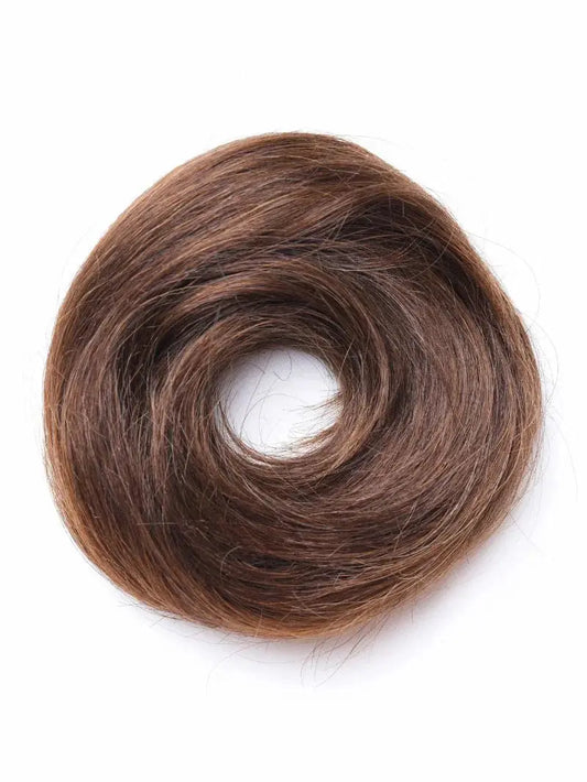 Brown hair bun on a white background