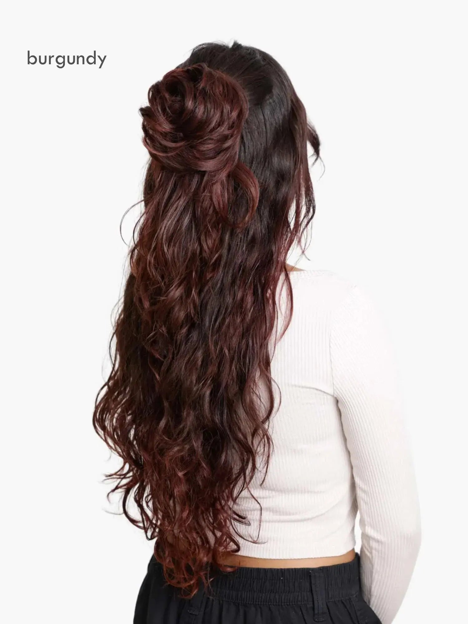 Burgundy hair extension styled in a half-up, half-down look on a white background.